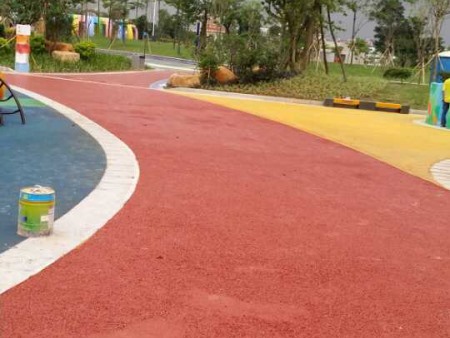 Colored abrasion resistant pavement coating